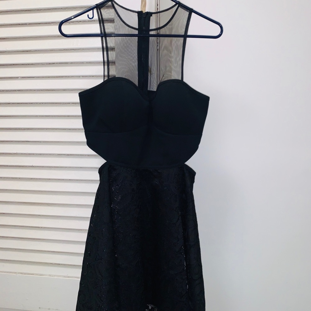 Bebe’s mesh lace black dress